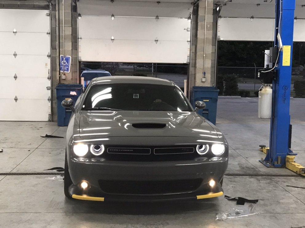 Grey Dodge Challenger in the Shades Audio shop
